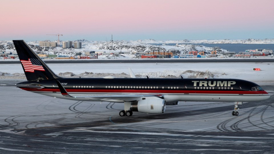 Trump-branded airplane on Greenland tarmac.