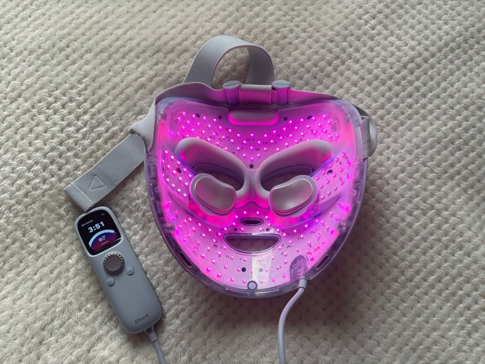 LED light therapy mask with control unit.