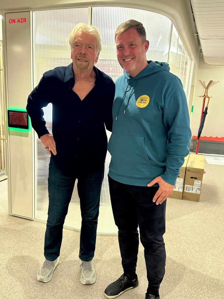 Richard Branson and Simon Squibb posing for a photo.