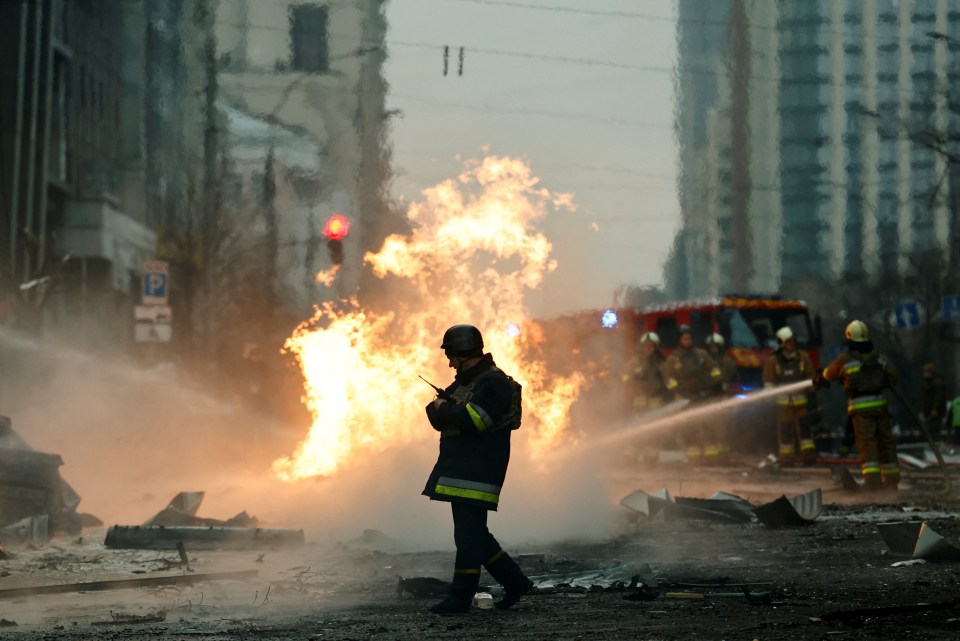 Rescue worker at a fire scene in Kyiv, Ukraine.