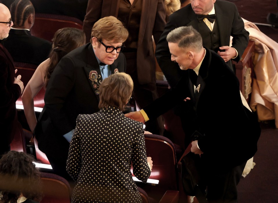 Elton John and David Furnish at the Oscars.